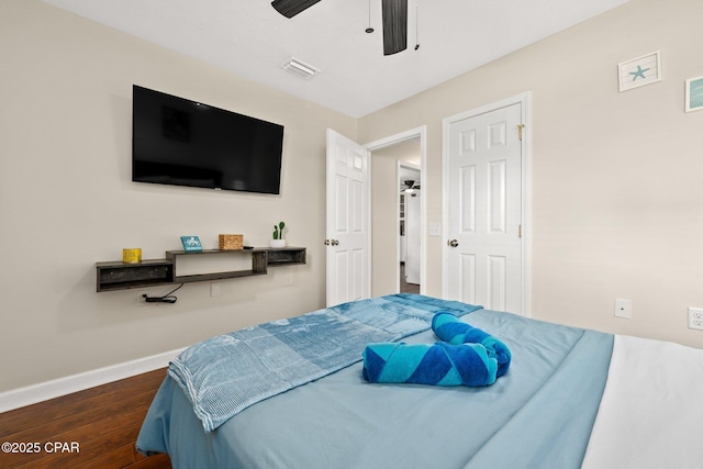 4025 Venus St, Panama City Beach, FL 32408 - bedroom featuring visible vents, wood finished floors, baseboards, and ceiling fan