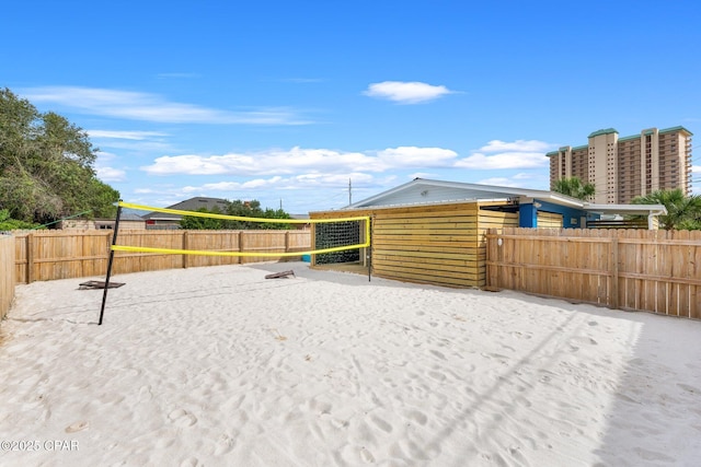 4025 Venus St, Panama City Beach, FL 32408 - view of yard featuring fence and volleyball court