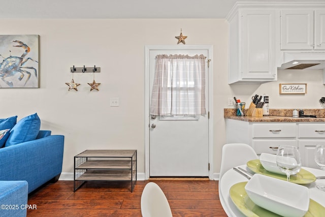 4025 Venus St, Panama City Beach, FL 32408 - dining area featuring baseboards and dark wood-style floors