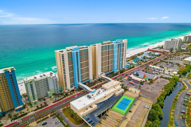 drone / aerial view featuring a water view and a view of city
