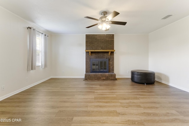 3947 Verona Cir, Panama City, FL 32405 - unfurnished living room with ornamental molding, light wood-type flooring, ceiling fan, and visible vents