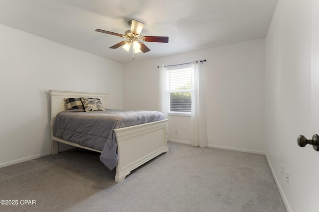 3947 Verona Cir, Panama City, FL 32405 - bedroom with a ceiling fan, baseboards, and light colored carpet