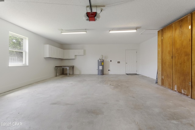 3947 Verona Cir, Panama City, FL 32405 - garage featuring a garage door opener and electric water heater