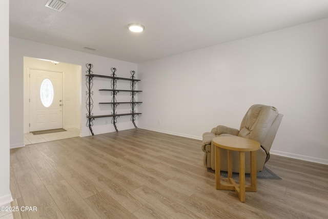 3947 Verona Cir, Panama City, FL 32405 - living area with baseboards, visible vents, and light wood-style floors