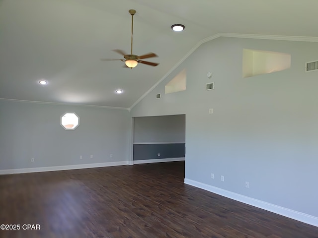 2525 E 40th Ct, Panama City, FL 32405 - unfurnished room featuring dark wood-style flooring, ceiling fan, baseboards, lofted ceiling, and visible vents