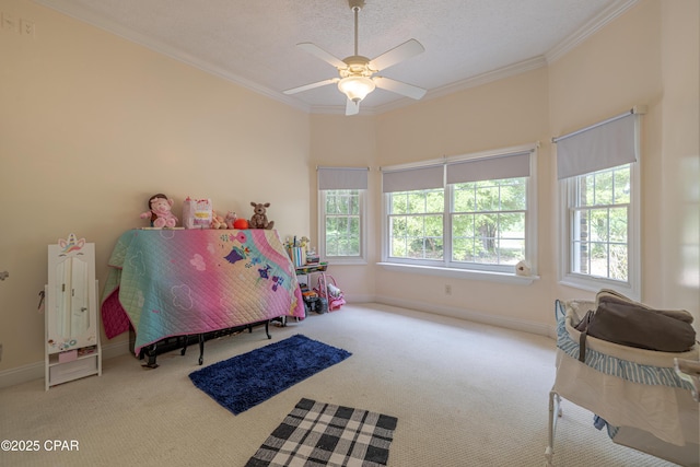 bedroom with carpet floors, ornamental molding, baseboards, and a textured ceiling