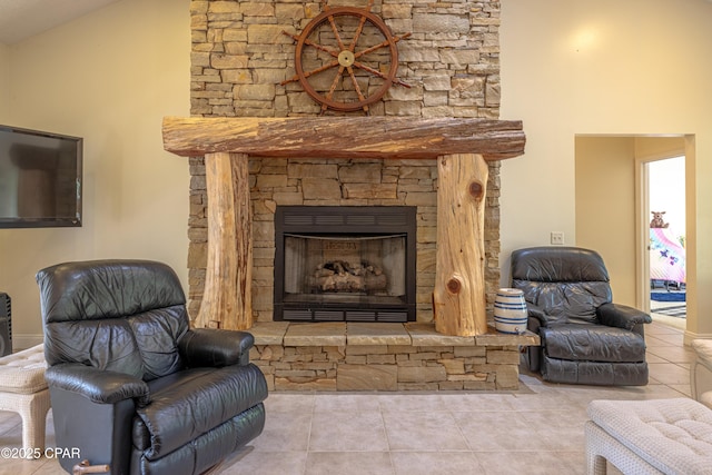 interior space with high vaulted ceiling and a fireplace