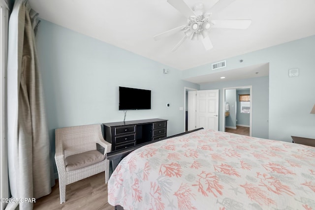 17739 Front Beach Rd Unit 1207W, Panama City Beach, FL 32413 - bedroom with visible vents, wood finished floors, and a ceiling fan
