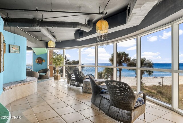 17739 Front Beach Rd Unit 1207W, Panama City Beach, FL 32413 - sunroom featuring a water view