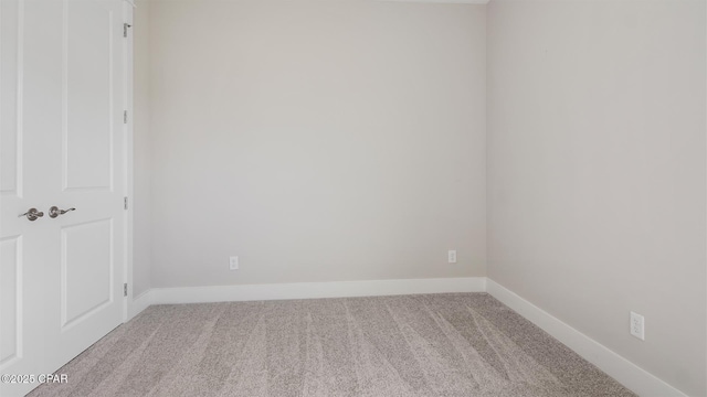 845 Walsonham Dr, Panama City Beach, FL 32407 - carpeted empty room with baseboards