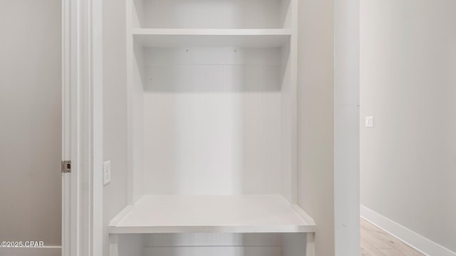845 Walsonham Dr, Panama City Beach, FL 32407 - mudroom featuring baseboards and wood finished floors