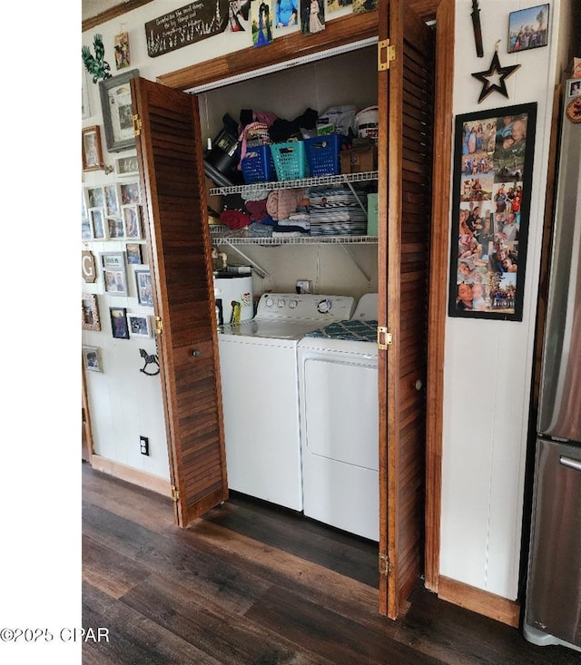 14235 NW Henry Grantham Rd, Altha, FL 32421 - clothes washing area featuring laundry area, dark wood finished floors, separate washer and dryer, and gas water heater