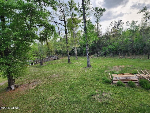 view of yard featuring fence