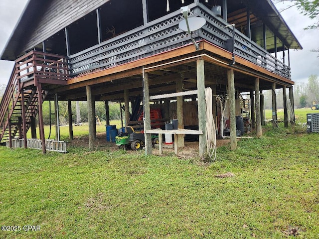 exterior space featuring a yard and a wooden deck