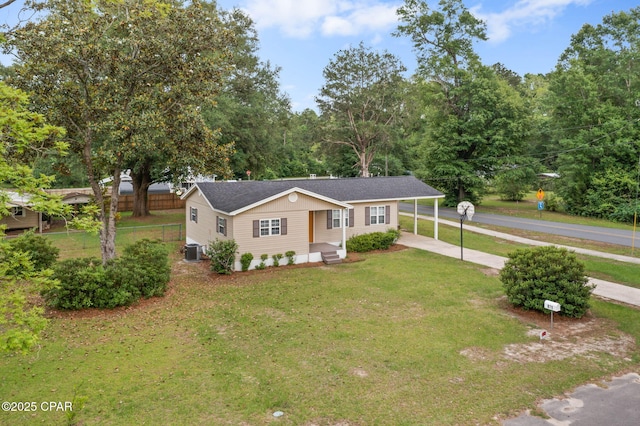 871 2nd St, Chipley, FL 32428 - single story home featuring cooling unit, driveway, and an attached carport