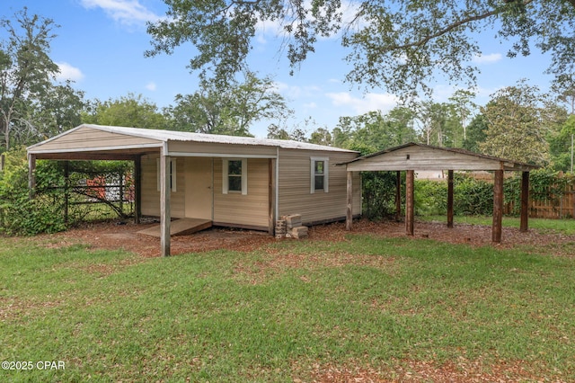 871 2nd St, Chipley, FL 32428 - view of outdoor structure with a carport