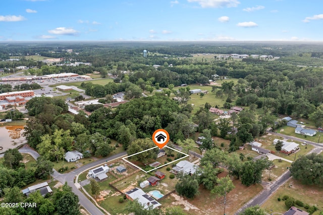 871 2nd St, Chipley, FL 32428 - aerial view of property and surrounding area featuring a forest