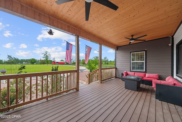 2612 NW County Road 274, Fountain, FL 32438 - wooden deck with a ceiling fan, outdoor lounge area, and golf course view