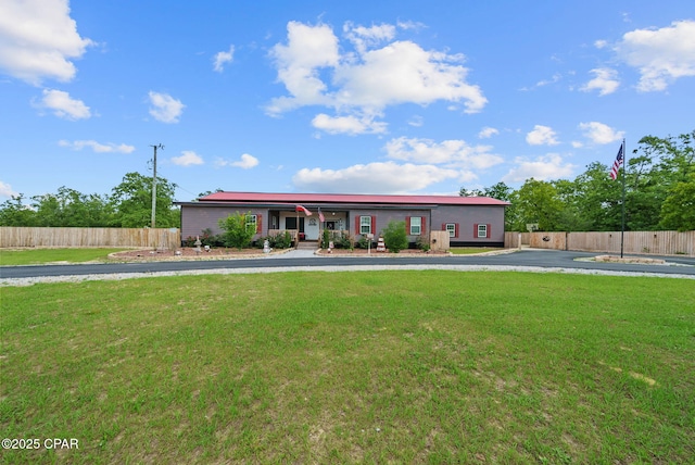 2612 NW County Road 274, Fountain, FL 32438 - view of front of property featuring fence, a porch, and a front yard
