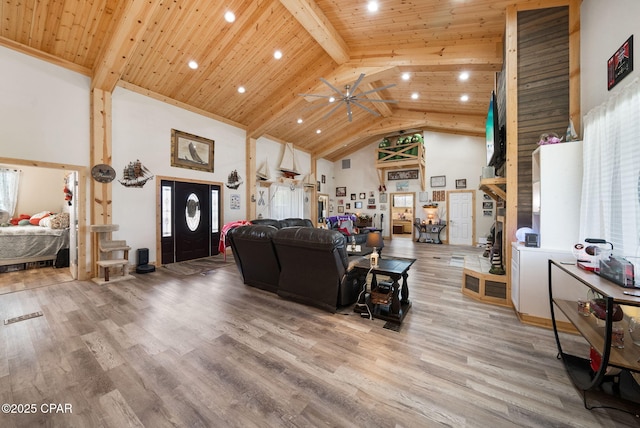 2612 NW County Road 274, Fountain, FL 32438 - living room with a ceiling fan, high vaulted ceiling, recessed lighting, and beam ceiling