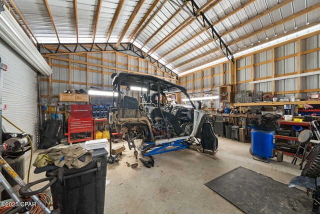 2612 NW County Road 274, Fountain, FL 32438 - garage with a workshop area and metal wall