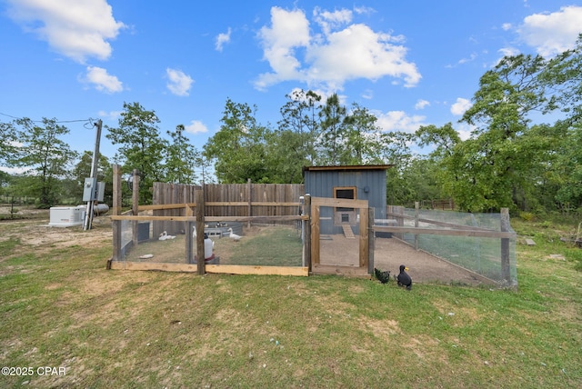 2612 NW County Road 274, Fountain, FL 32438 - exterior space with exterior structure, fence, and an outbuilding