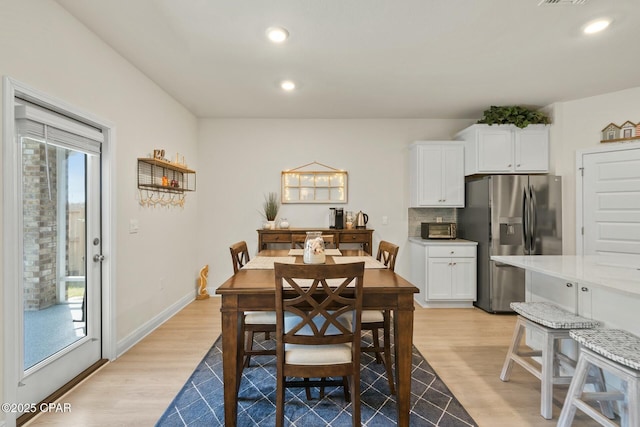 1294 Conolly Blvd, Lynn Haven, FL 32444 - dining area featuring light wood-type flooring, recessed lighting, and baseboards