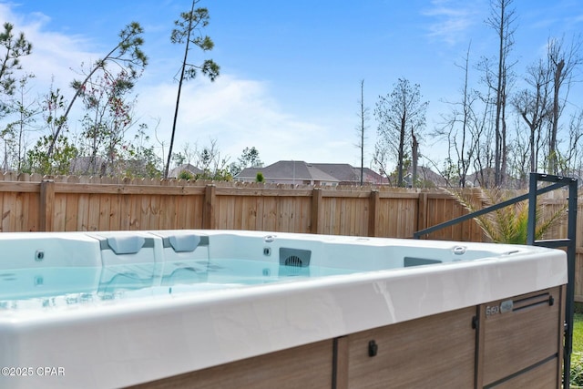 1294 Conolly Blvd, Lynn Haven, FL 32444 - view of swimming pool with a hot tub and fence