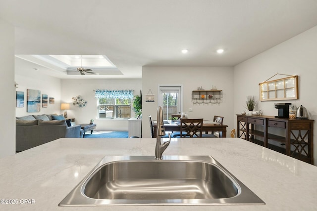 1294 Conolly Blvd, Lynn Haven, FL 32444 - kitchen with a sink, a ceiling fan, open floor plan, recessed lighting, and a tray ceiling