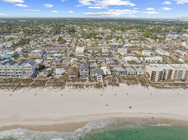 aerial perspective of suburban area with waterfront with a beach