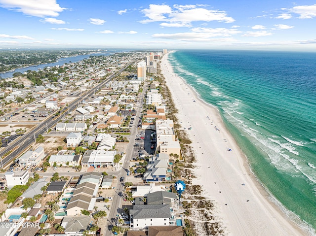 aerial view of residential area with expansive coastline