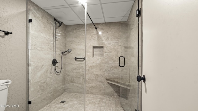 full bath featuring a shower stall