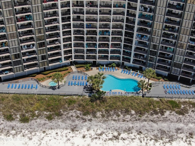 community pool featuring a patio area