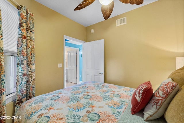 bedroom with a ceiling fan and visible vents