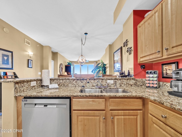 kitchen featuring a notable chandelier, light stone counters, visible vents, and stainless steel dishwasher