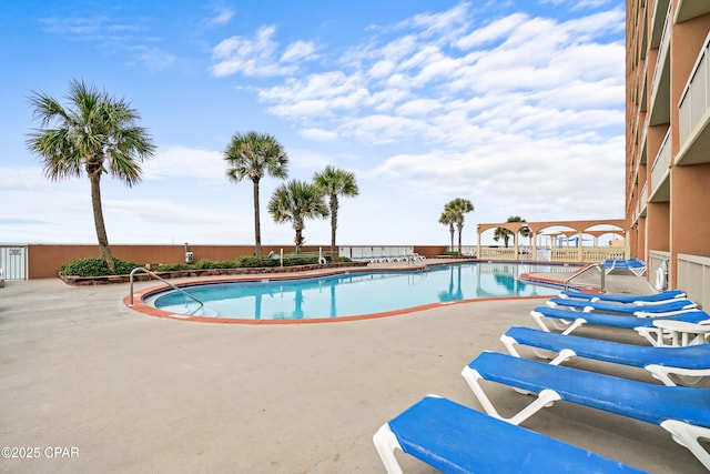 pool featuring a patio area