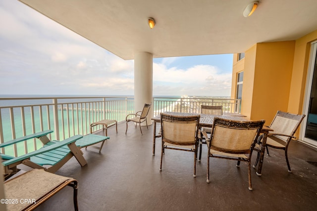 balcony featuring a water view