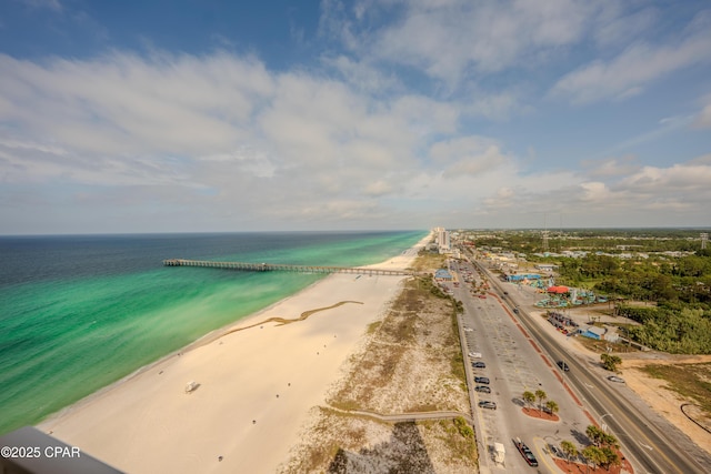 aerial view featuring a water view and a view of the beach
