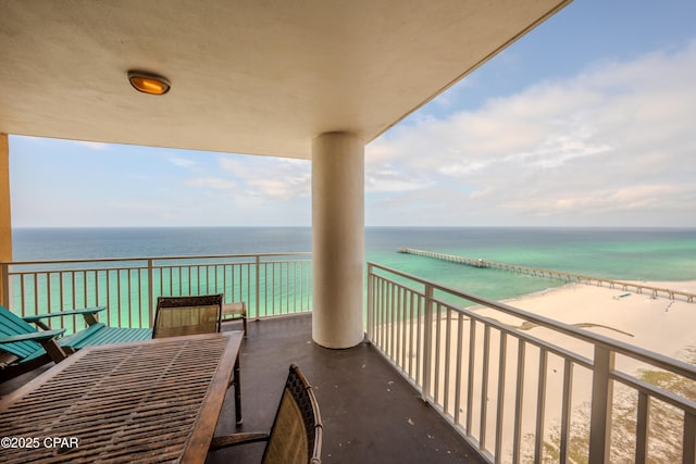 balcony featuring a water view