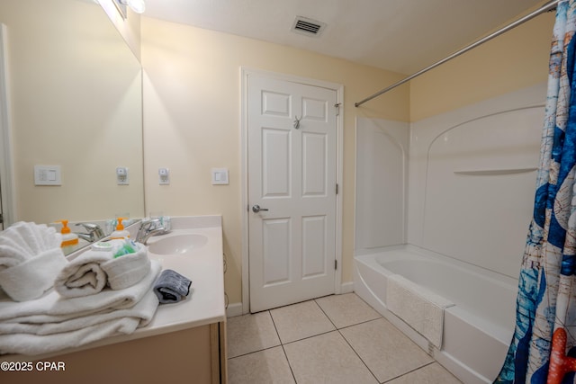bathroom with visible vents, tile patterned flooring, vanity, and shower / tub combo with curtain