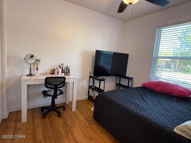 25 Wood Ave, Panama City, FL 32404 - bedroom featuring light wood finished floors, baseboards, and a ceiling fan
