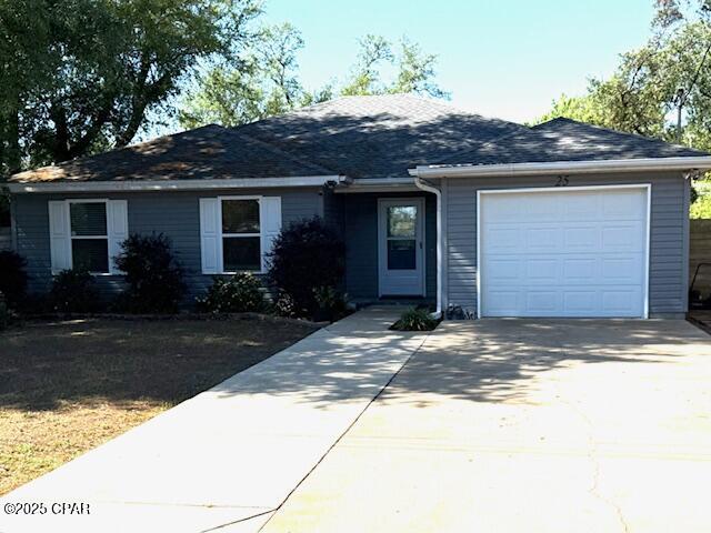 25 Wood Ave, Panama City, FL 32404 - ranch-style home with driveway and a garage