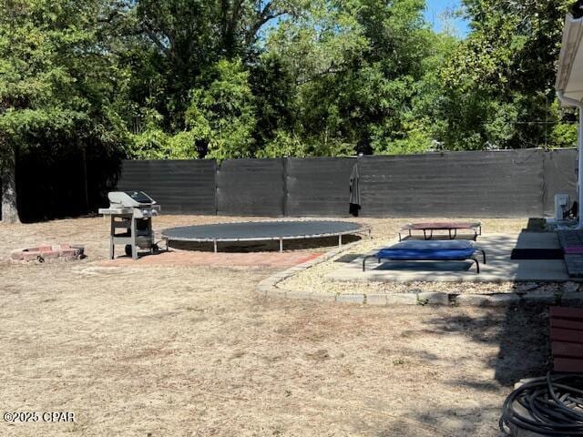 25 Wood Ave, Panama City, FL 32404 - view of yard with a trampoline and fence