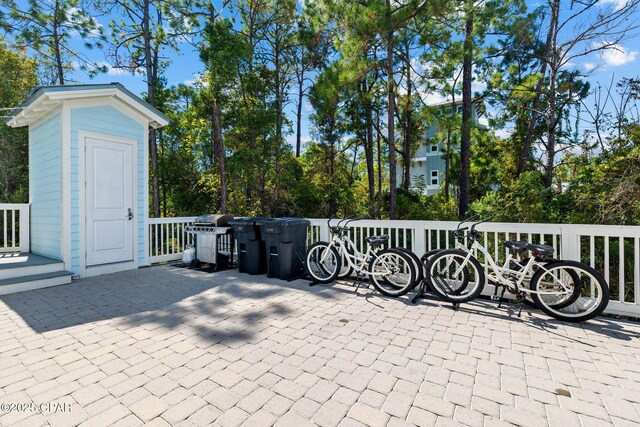 345 Redbud Ln, Inlet Beach, FL 32461 - view of patio / terrace featuring area for grilling, view of scattered trees, and an outdoor structure