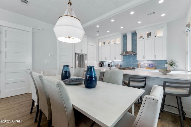 345 Redbud Ln, Inlet Beach, FL 32461 - dining space featuring recessed lighting, wood finished floors, and beam ceiling