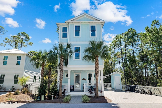 345 Redbud Ln, Inlet Beach, FL 32461 - view of front of house with board and batten siding and covered porch