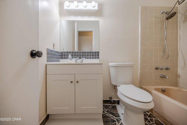 215 Tates Ln, Southport, FL 32409 - bathroom with toilet, baseboards, vanity, decorative backsplash, and shower / washtub combination