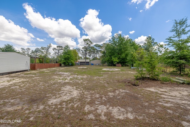 215 Tates Ln, Southport, FL 32409 - view of yard featuring fence