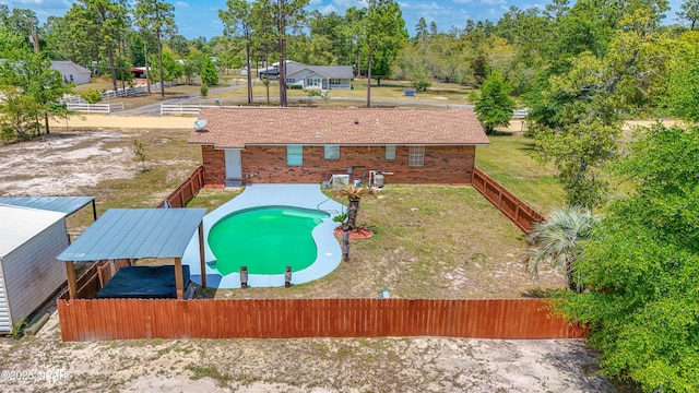 215 Tates Ln, Southport, FL 32409 - view of pool with a fenced backyard, a fenced in pool, and a yard