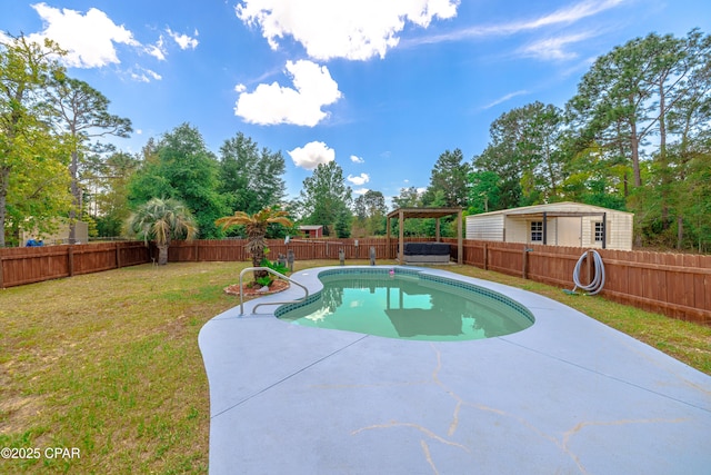 215 Tates Ln, Southport, FL 32409 - view of pool with a patio, an outbuilding, a fenced backyard, a fenced in pool, and a lawn